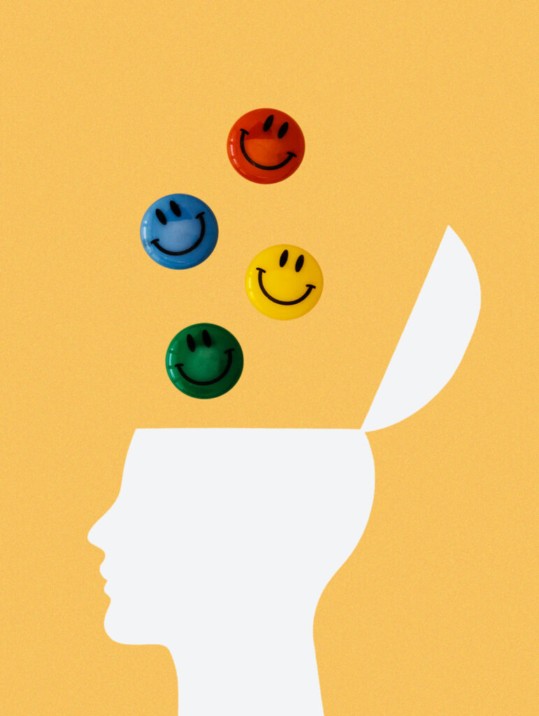 Illustrated brain with colorful emojis, offering tips for stress relief and mood boost in mental health